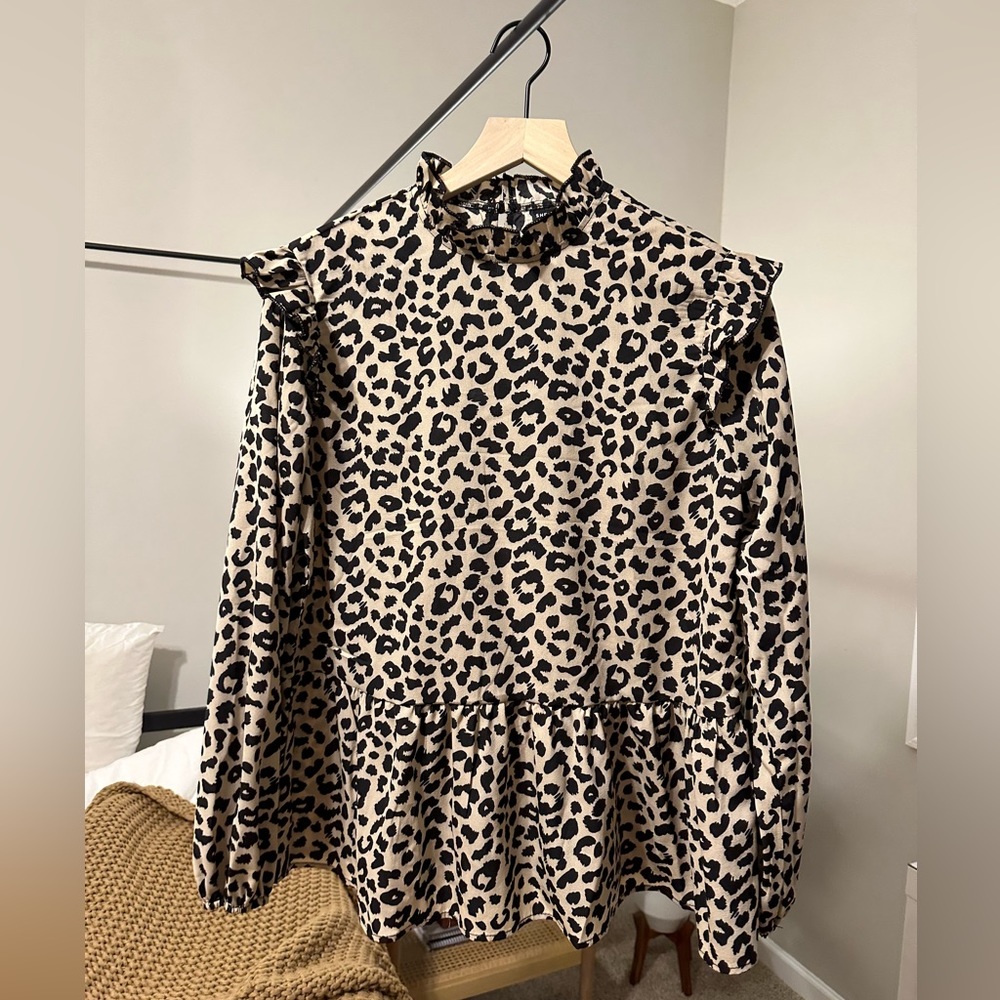 Women’s ruffle cheetah long sleeve shirt